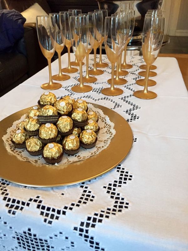 Gold Painted Champagne Flutes and Ferrero Roche